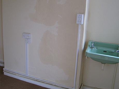 Hygroscopic Salt Contamination shown affecting the plaster on a wall
