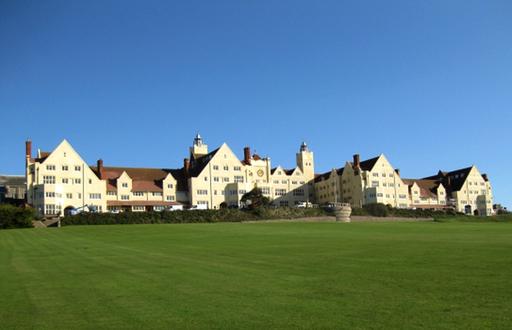 Roedean School in Brighton with a green field in the foreground